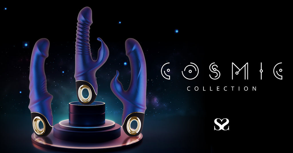 Three purple shining long rubber banana shaped objects are front and centre on a black starry night background.