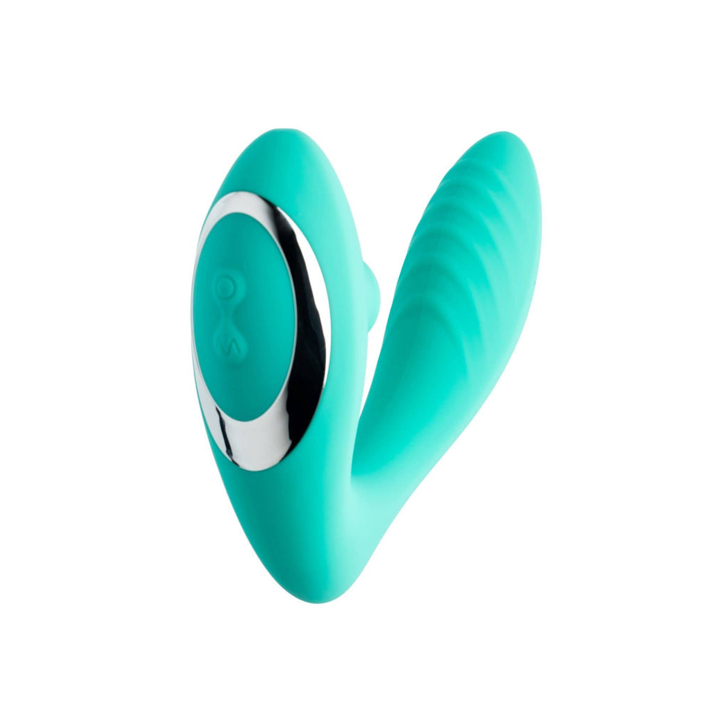 Teal green rubber looking material in the shape of a U with a shint gold ring around the raised control panel.