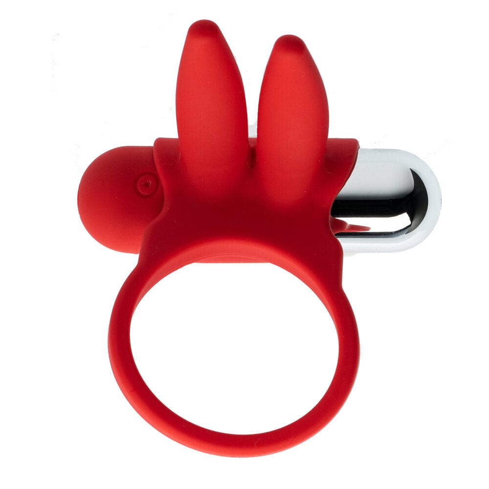 A bright red rubber object that has a round ring at the bottom, a shiny chrome side and two red rabbit ears at the top.