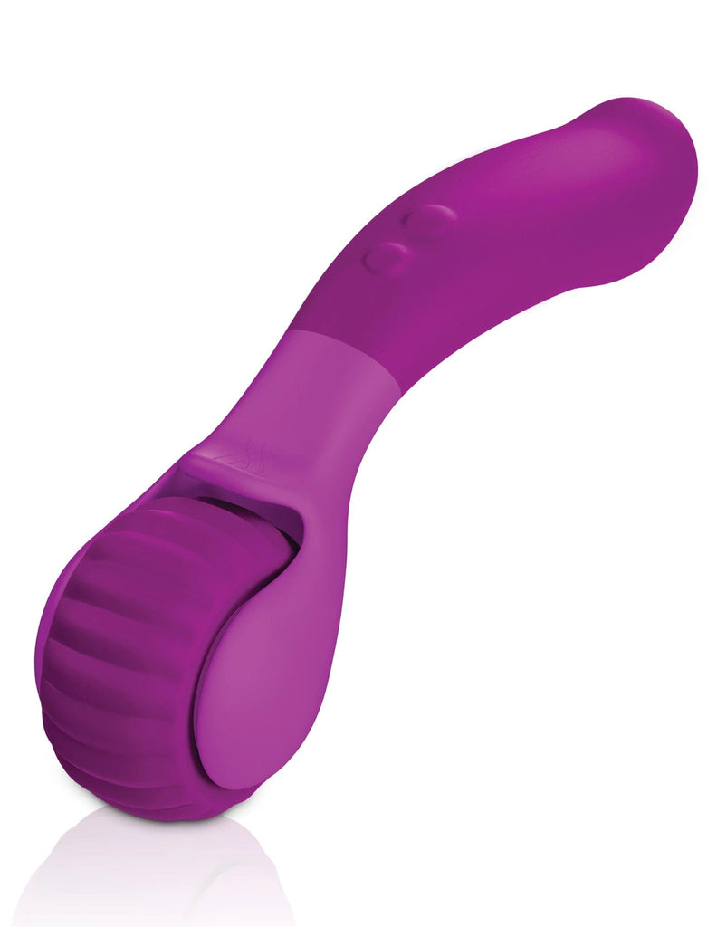 A purple pastry cutting looking tool with a roller on one end and soft handle on the other and two buttons in the middle.
